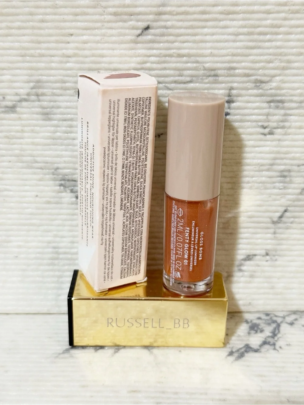 Fenty Beauty Gloss Bomb Lip Luminizer in Fenty Glow Shimmering Rose Nude